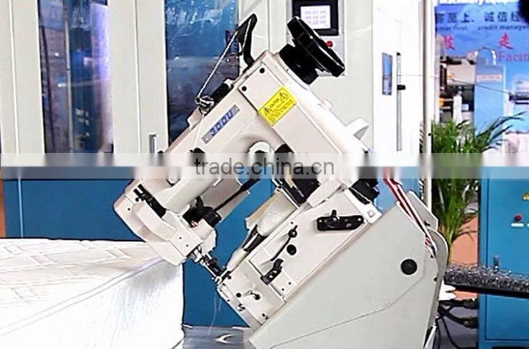 Mattress making machine tape edge machine with adjustable table