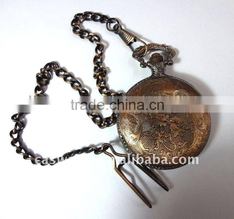 Vintage pocket watch of embossed Eiffel Tower
