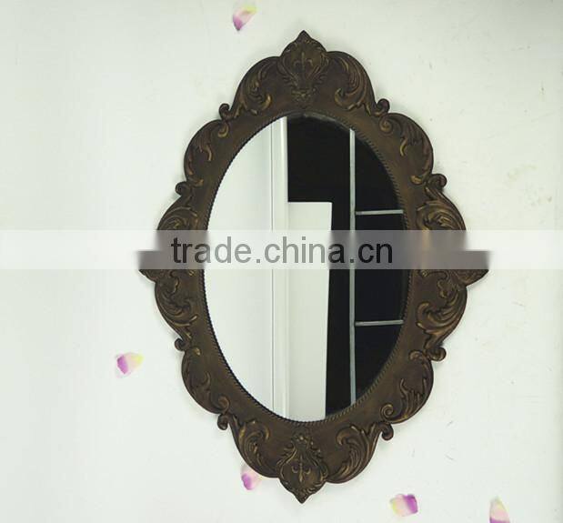 Shabby chic metal antique wall mirror in oval shape