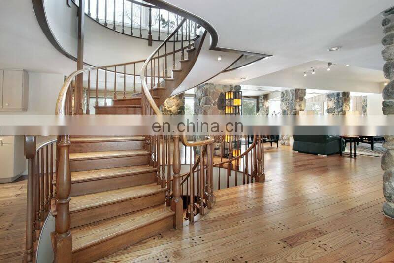 Wood step close riser metal railing curved staircases