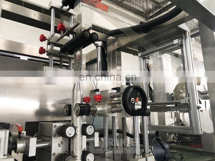 Automatic double head heat shrink sleeve label labeling machine for cup jelly