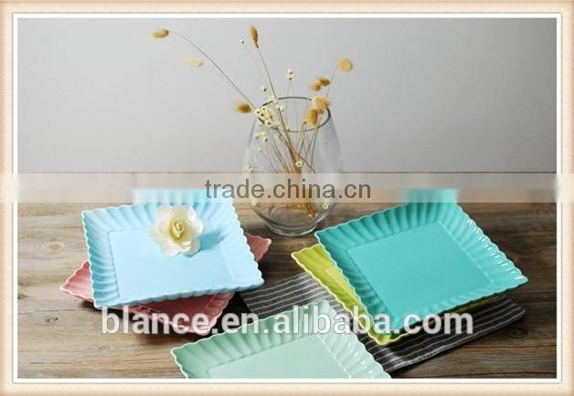 colorful dinner plates set in square shape