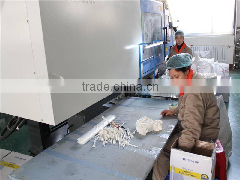 single-use polystyrene printed plastic cutlery (forks packet)