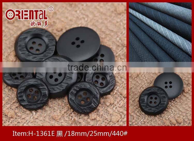 High end black plastic coat button with engrave pattern