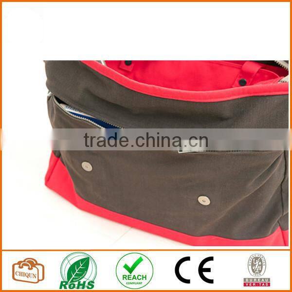 Big messenger bag in brown and red cotton-polyester mix. Unisex