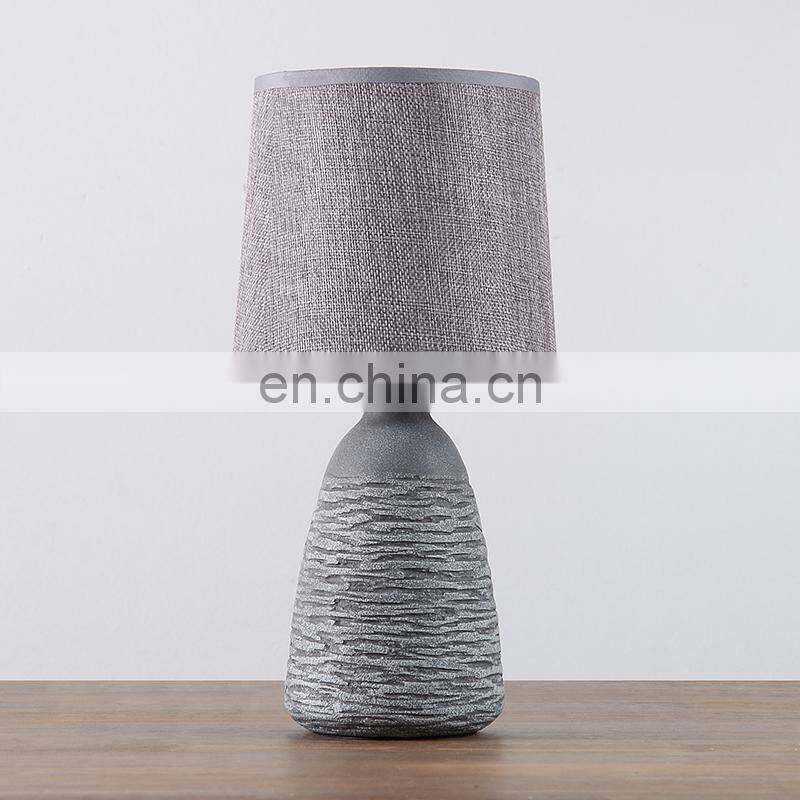 antique ceramic meterial beside table lamp