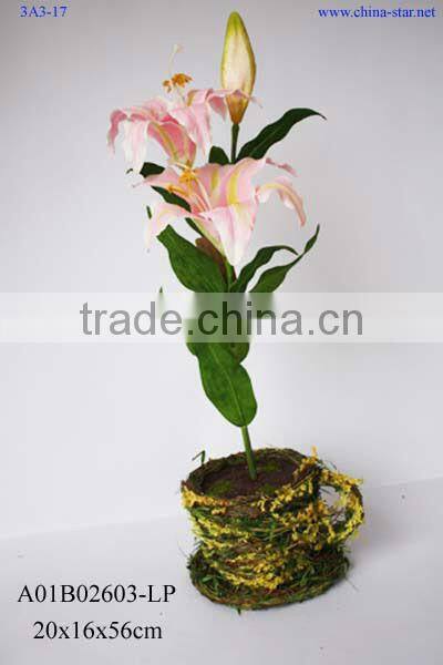artificial lily with glass pot