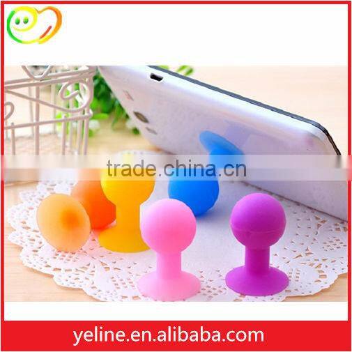 The 360 degree pad stand holder on car seat headrest back