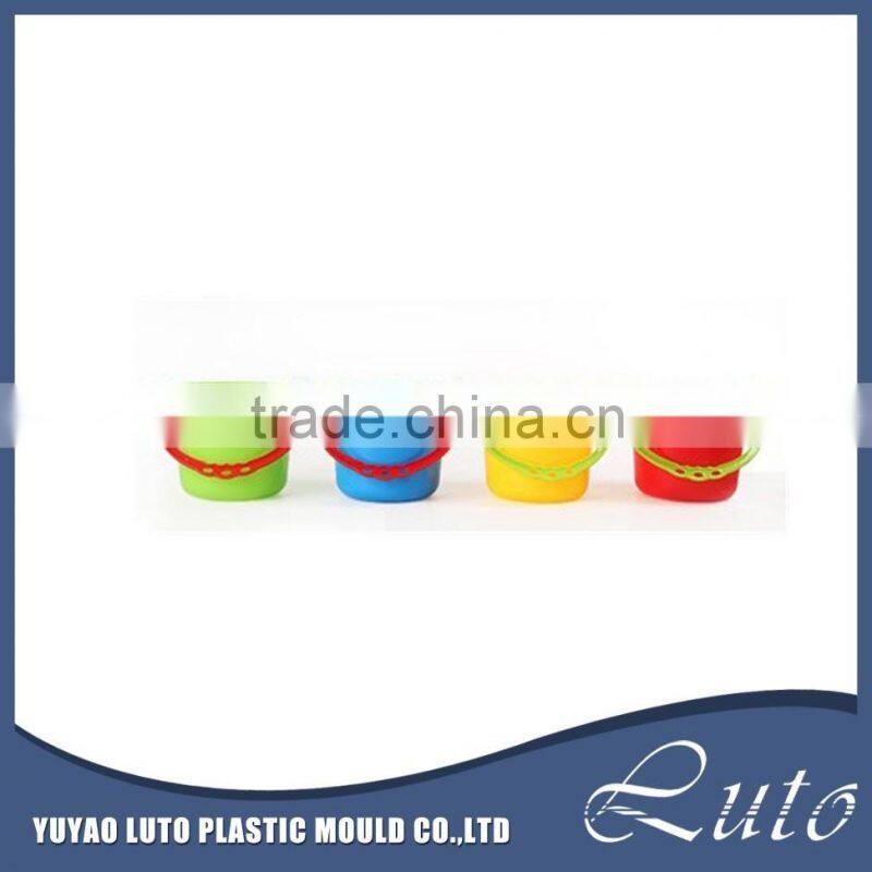 Summer holiday sand beach toy shovel and plastic buckets