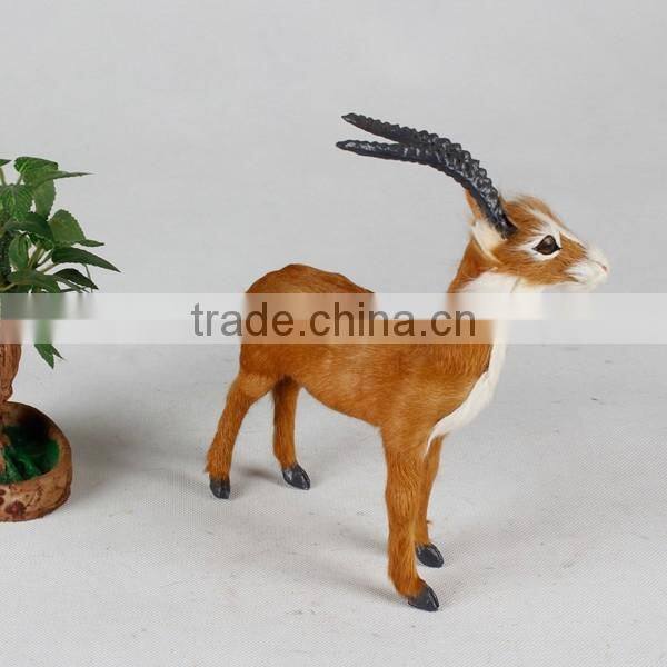 Ornamental plastic animal horn products on sheep