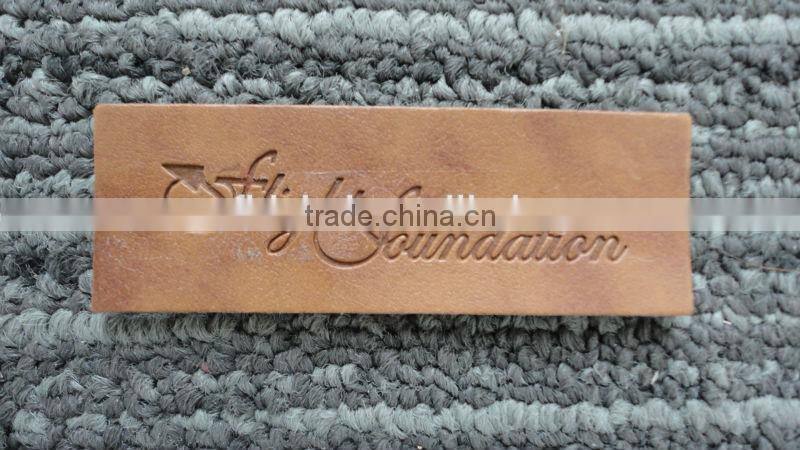 High quality customized debossed real brown leather label for jeans