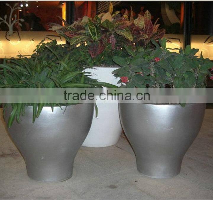 Grey fiberglass flower pot