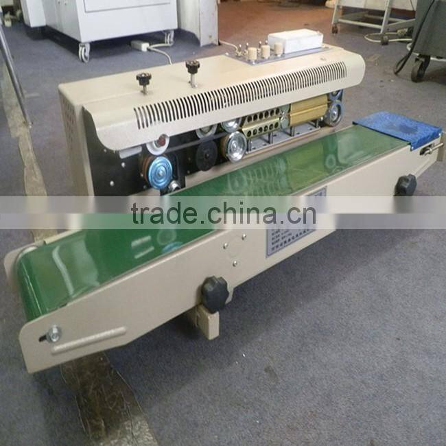 Porfessional design continuous type sealing machine/plastic bags sealer machine price