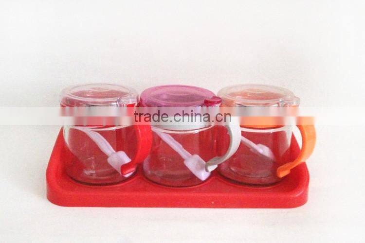 kitchenware colored glass salt pepper condiment jar with handle and sleeve