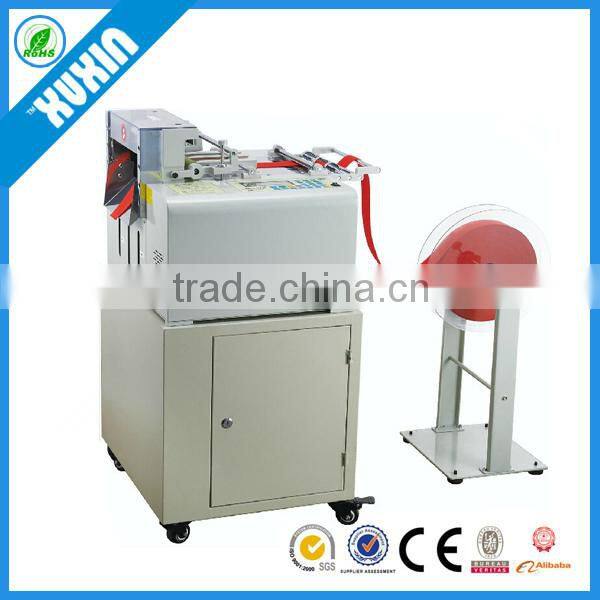 X-09C Computer controlled Tape Cutting Machine with cold knife