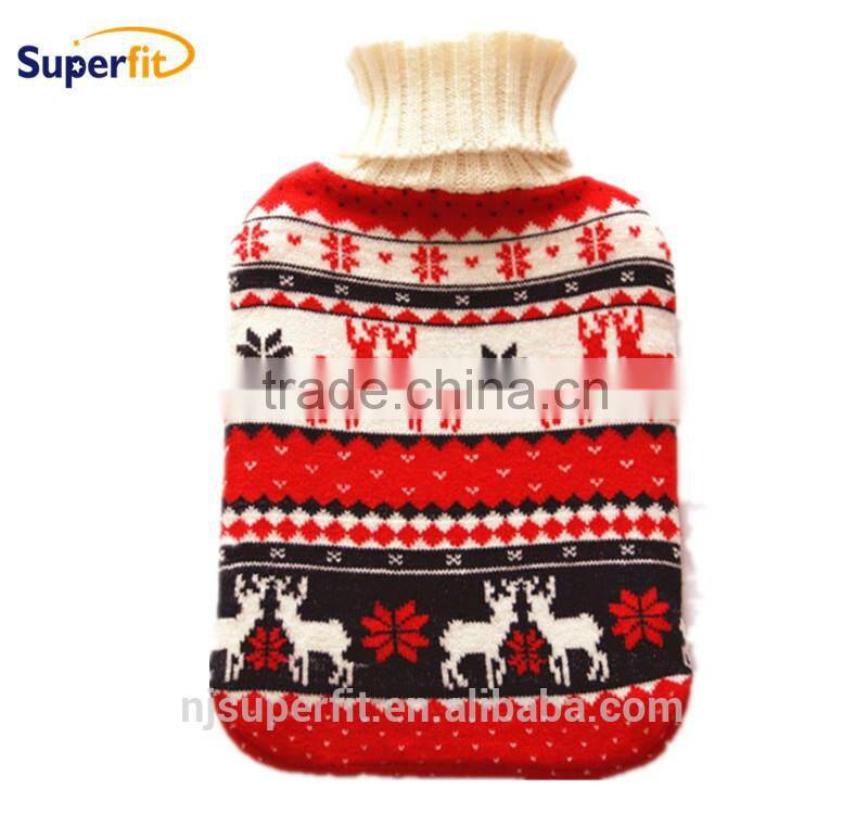 hot water bottle with black white knitted cover