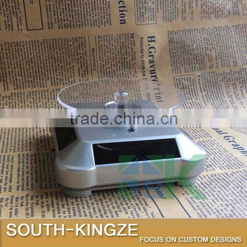 Silver Acrylic Watch/Jewelry/Camera Solar Power Rotating Display Stand