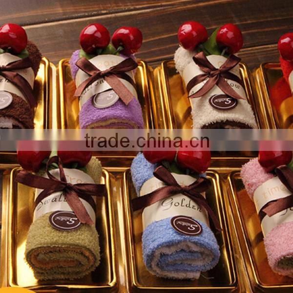 China OEM manufacture hot selling 100% cotton towel cake souvenir