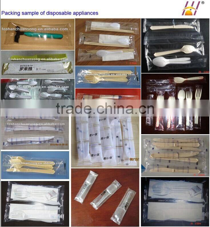 Diposable spoons wrapping machine, packaging machinery for plastic spoons, tissue and spoon packing machine