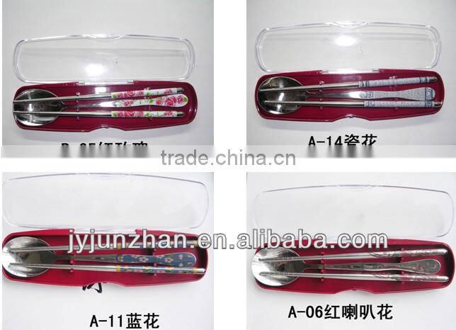 Cheap chopsticks and spoon sets made in China ( With blue flower stick on)