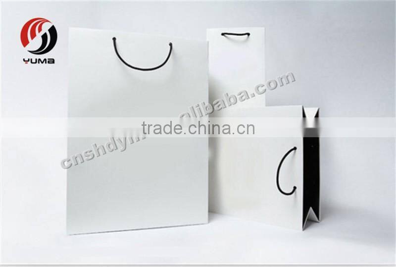 gold round cake board with tab paper bag