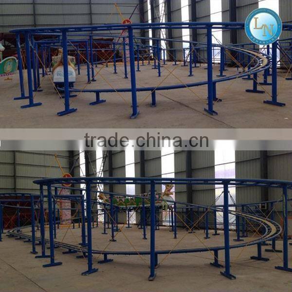 Amusement park children electric train toy ride slide dragon train/roller coaster for sale