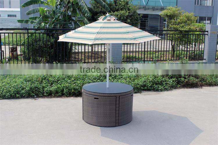 Round patio dining set with umbrella