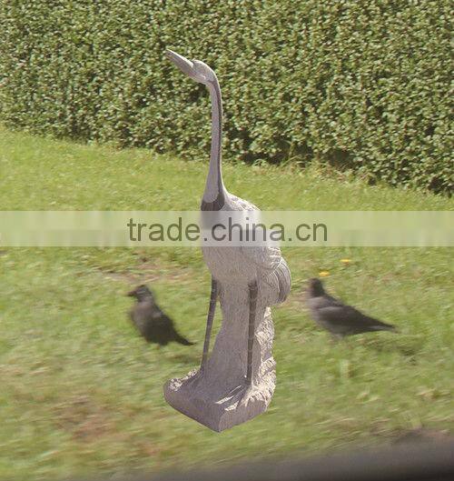 hand carved stone bird sculpture