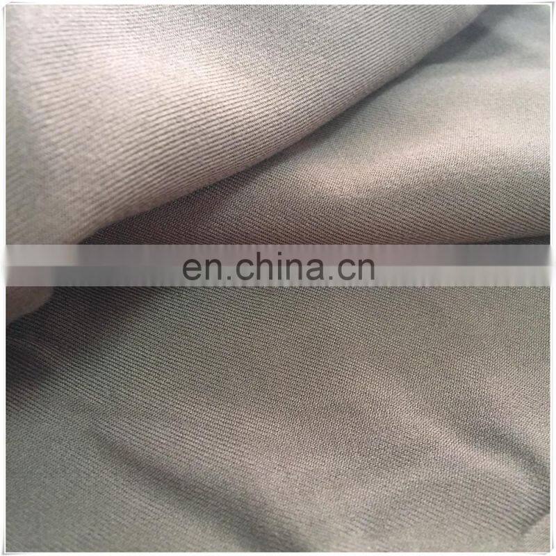 rayon twill fabric dyed in solid brown color with sandwash