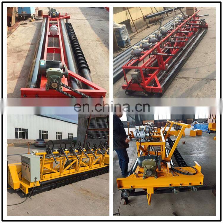 concrete road paver machine showing the first auger blade roller laying machine