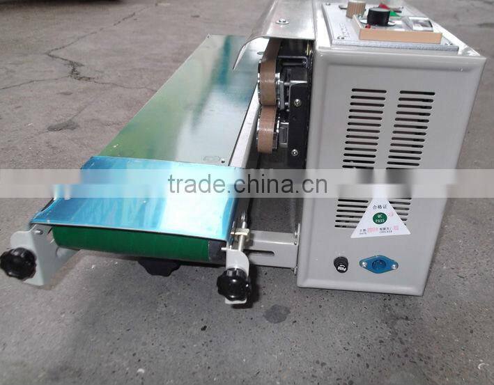 Plastic Film Sealing machine+Vertical Sealing+date printing+seal belt