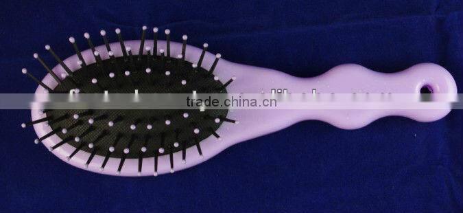 Small oval cushion brush