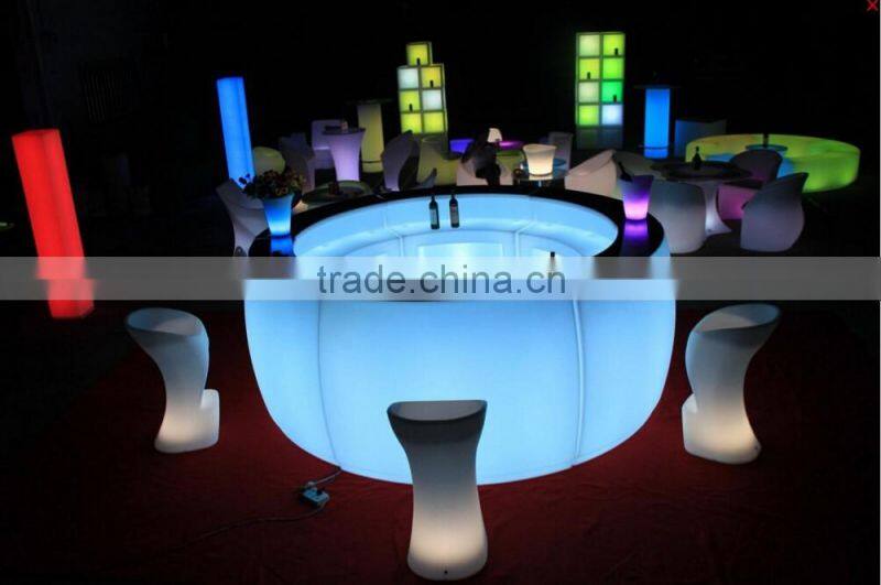 Commercial round plastic illuminated LED bar counter with chairs