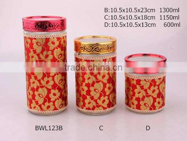 glass storage jar with plastic lid and leather