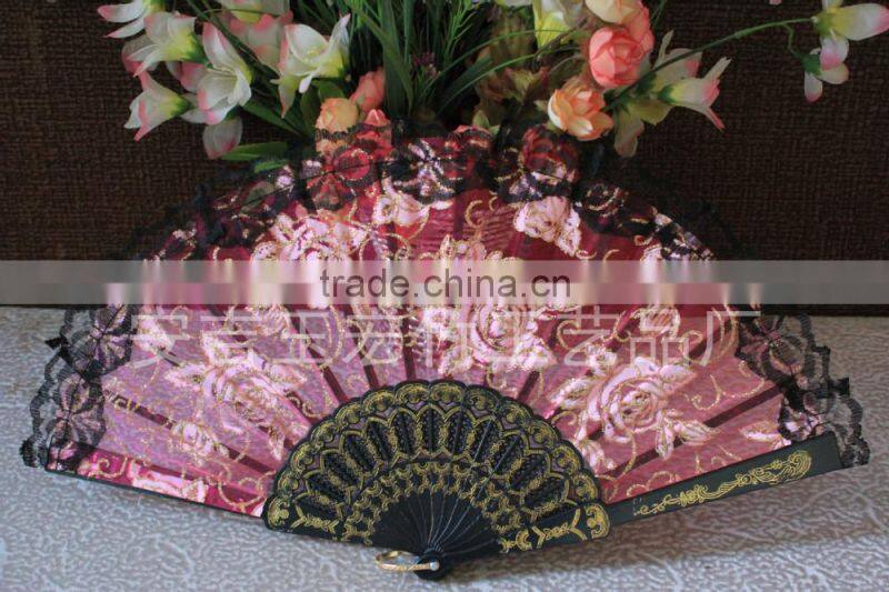 Beautiful and colorful plastic lace fan