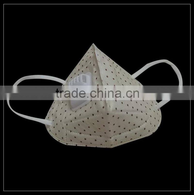 Yellow spunlace nonwoven fabric protective face mask with valve