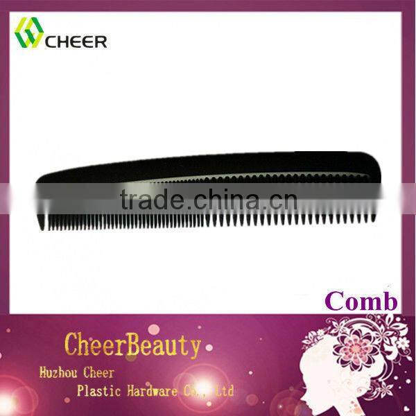 small plastic hair comb