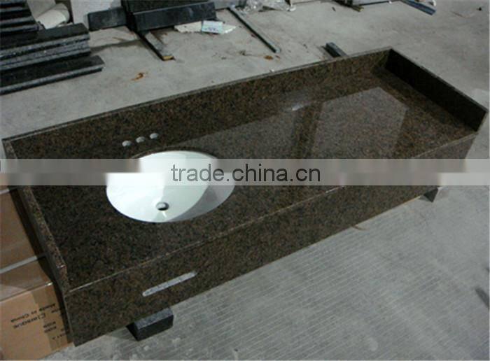 black countertop, sinks and holes