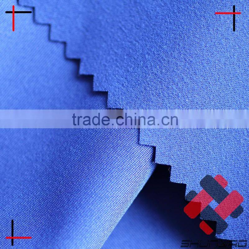 mechanical stretch microfiber peach twill fabric for beach shorts