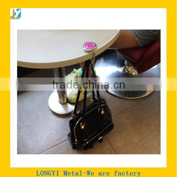 magnetic folding metal bag hanger