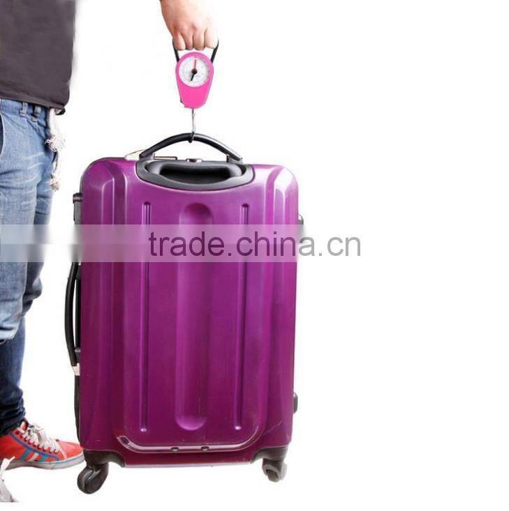 Hand-held portable luggage scale