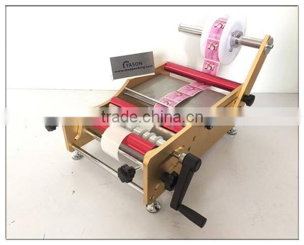 Manual Round Adhesive Bottle Labeling machine,adhesive labeling machine for Round bottle, round jar or cylinder