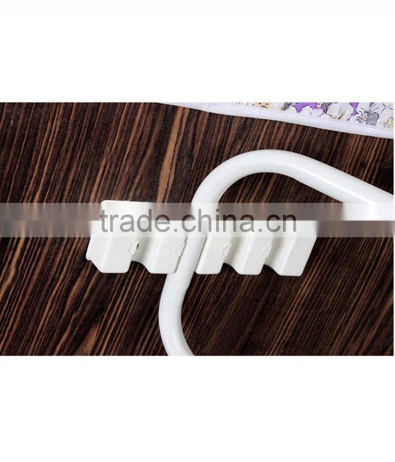 wooden ironing board with color cover