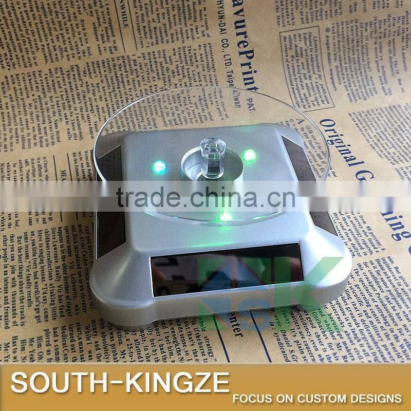 Silver Acrylic Watch/Jewelry/Camera Solar Power Rotating Display Stand