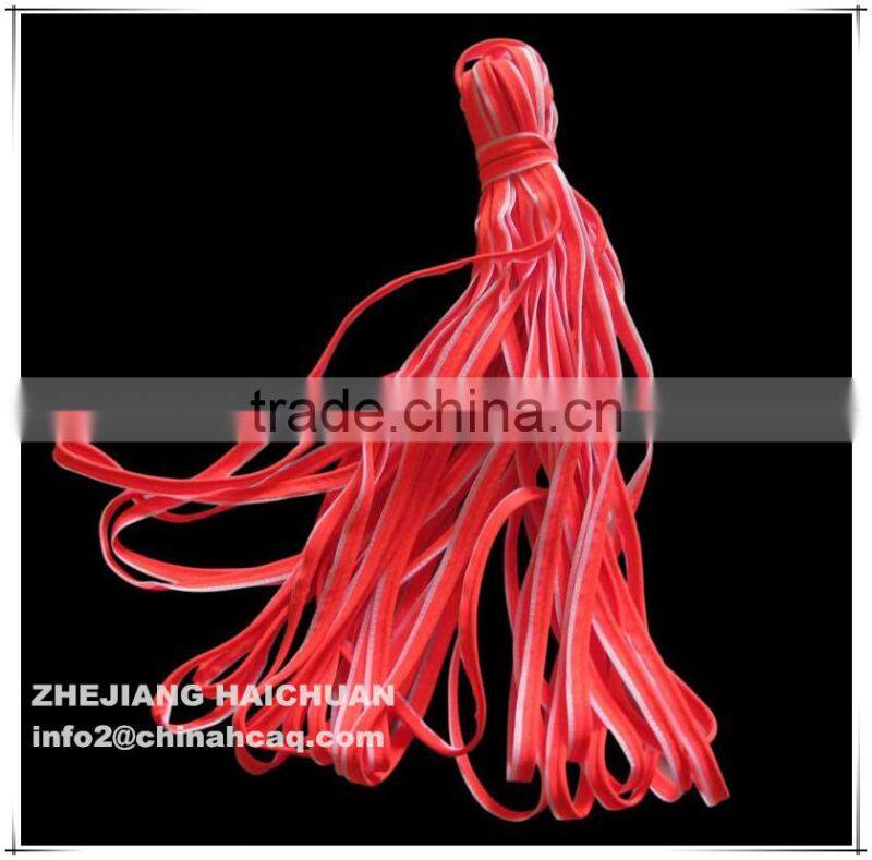Red reflective piping for garment