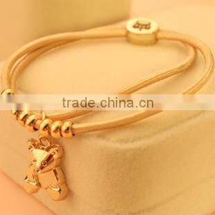2015 newest gold bangle charm bracelet , lovely bear bowknot bracelet newest bangle/ bracelet