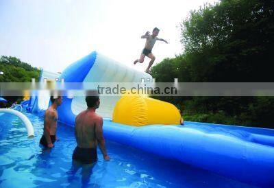 Children playing inflatable bouncing castle