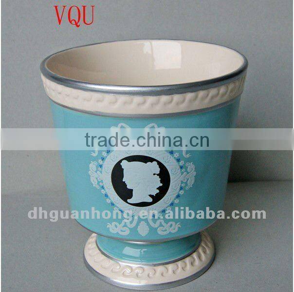 Stock ceramic flower pot in pink color round shape