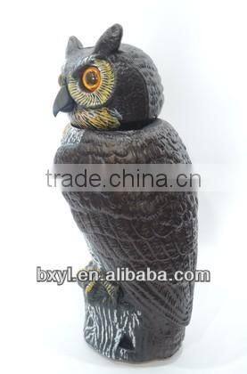 cute smart garden owl with plastic bobbling head activated moving by wind action