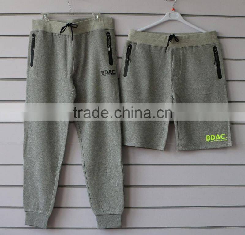 100% cotton men jogging pants with side waterproof pockets and logo print